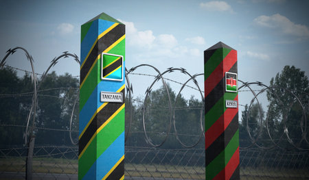 Border posts with flags of Tanzania and Kenya - 3d illustrationの写真素材