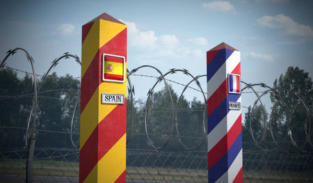 Border posts with flags of Spain and France - 3d illustrationの写真素材