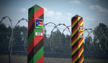 Border posts with flags of South Sudan and Uganda - 3d illustrationの写真素材