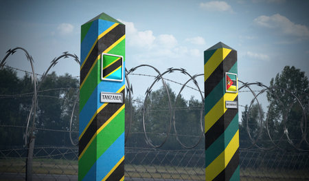 Border posts with flags of Tanzania and Mozambique - 3d illustrationの写真素材