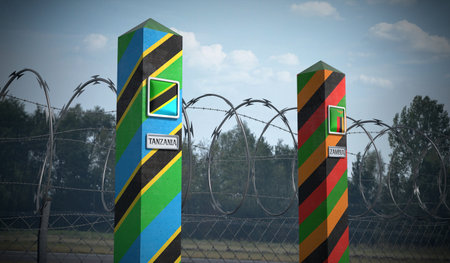 Border posts with flags of Tanzania and Zambia - 3d illustrationの写真素材
