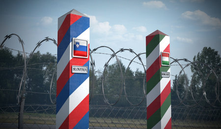 Border posts with flags of Slovenia and Hungary - 3d illustration