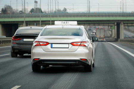 White Taxi is Driving Fast on the Highway