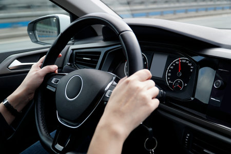 Driver Keeps Hands on Steering Wheel While Driving