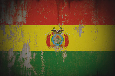 Bolivia - Weathered Flag on Old Wall with Peeling Paint and Rustの写真素材