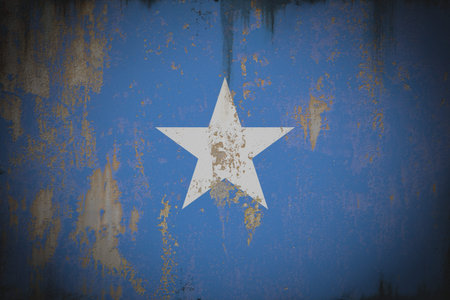 Somalia - Weathered Flag on Old Wall with Peeling Paint and Rustの写真素材
