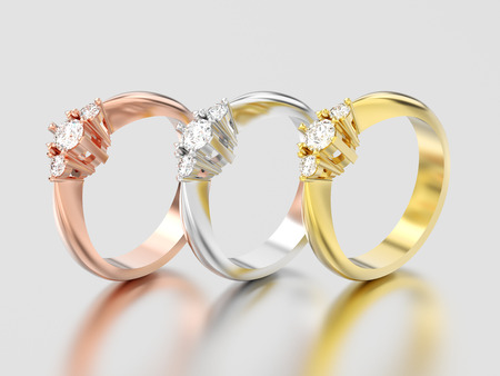 3D illustration three yellow, rose and white gold or silver three stone diamond rings on a gray backgroundの写真素材
