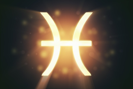 Pisces  the fishes , zodiac horoscope astrology sign with warm color glowing surface  の写真素材