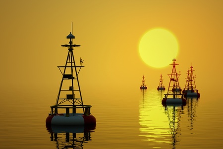 Buoys floating on the sea at the setting sun の写真素材