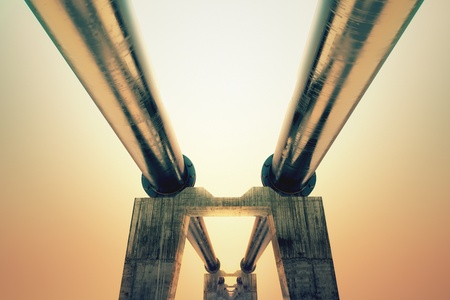 Bottom shot of a pipeline at sunset. Pipeline transportation is most common way of transporting...