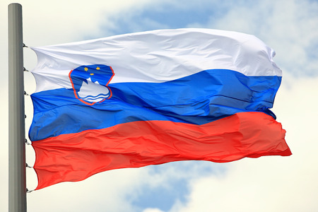 Flag of Slovenia against the skyの写真素材