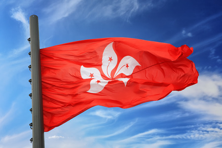 Flag of Hong Kong against the blue sky