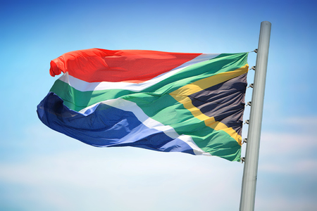 Flag of South Africa against the background of the blue skyの写真素材