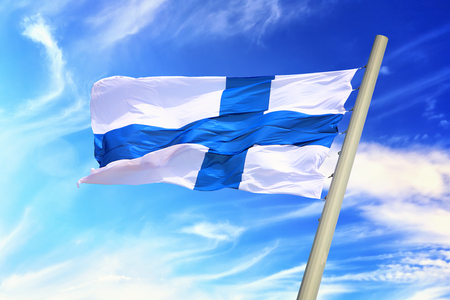 Flag of Finland against the background of the skyの写真素材