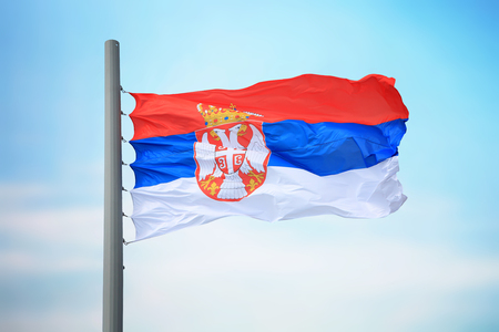 Flag of Serbia against the background of the skyの写真素材