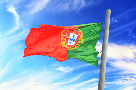 Flag of Portugal against the background of the skyの写真素材