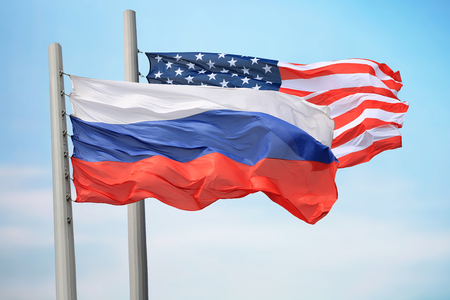 Flags of Russia and the USA against the background of the blue skyの写真素材