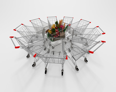 Full Shopping Cart In The Center Of Empty Shopping Cartsの写真素材