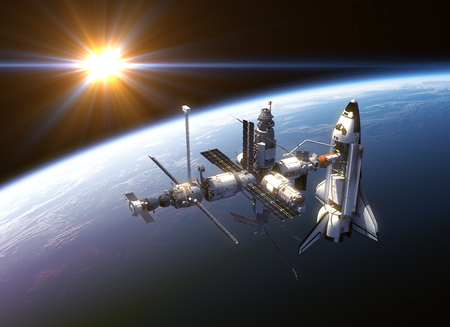 Space Shuttle And Space Station In The Rays Of Sunの写真素材
