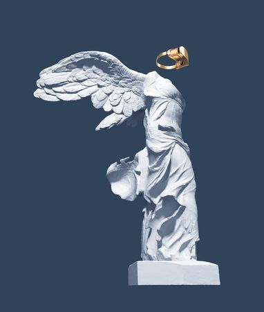 3D Model Of Winged Victory With Golden VR Glasses On Blue Background. Concept Of Art And Virtual Reality.の写真素材