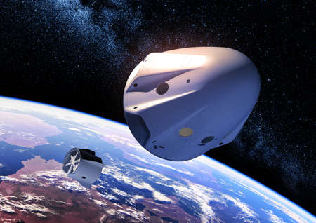 Separation of the descent module from a private spacecraft on background of Earthの写真素材