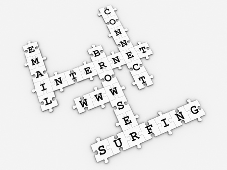 Puzzle pieces forming a crossword puzzle with internet related words の写真素材