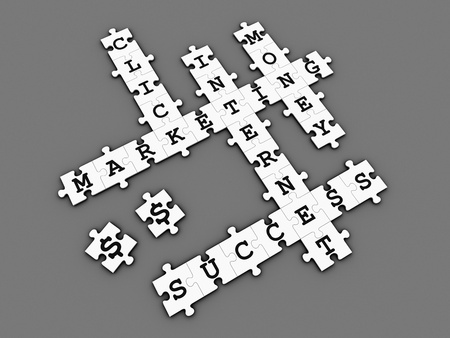 Puzzle pieces forming a crossword puzzle with internet marketing related words の写真素材