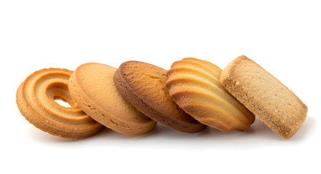a close up shot of assorted butter cookies, delicious danish cookies, isolated on a white backgroundの素材