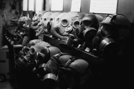 Moscow 17.11.2019. Retro Soviet gas masks in old underground Soviet bunker. Environment nuclear pollutionのeditorial素材