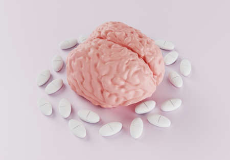 human brain surrounded by pills on light background, nootropic for the brain or headache pill, a...