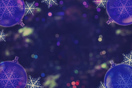 Beautiful Christmas balls with snowflakes on blurry lights background. Design for your ad, poster, bannerの写真素材