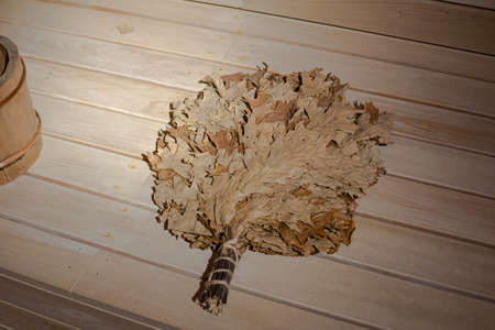 bath broom made of oak leaves in a Russian bathの写真素材