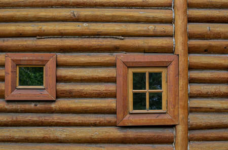 a small windows in a wooden hutの写真素材