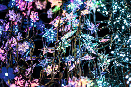 Christmas multicolored light garlands close up, different garlands in shopping center, selective...
