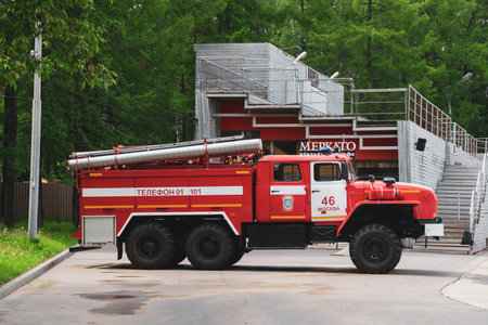 Moscow, Russia - June 6, 2020: Parked red russian fire truck in Sokolniki park