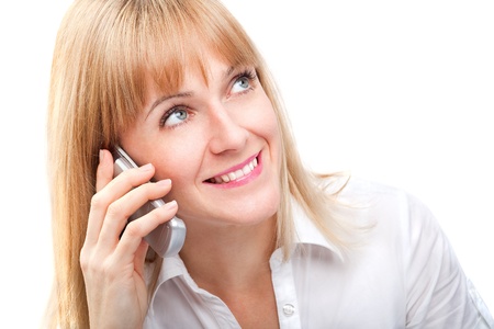 Beautiful woman talking on her cell phoneの写真素材