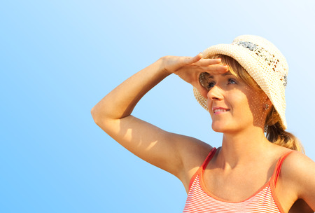 Woman enjoying natural landscape backgroundの写真素材
