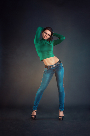 Young beautiful girl in jeansの写真素材