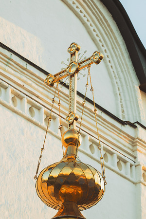 golden dome of the temple against the sky.の写真素材
