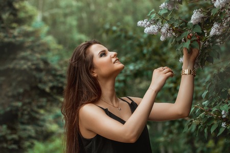 Beautiful young girl in autumn forest. autumn parkの写真素材
