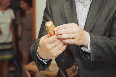Couple Wedding rings on cup cake. Wedding symbols, attributes. Holiday, celebration. with blur couple heart and flowersの写真素材