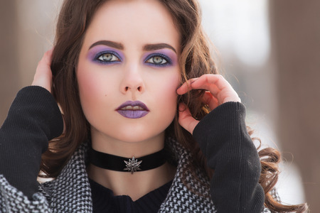 Beautiful girl in winter forestの写真素材