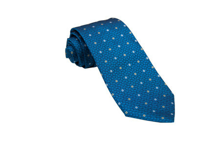 Closeup of an elegant stylish tie rolled and isolated on a white background.の写真素材