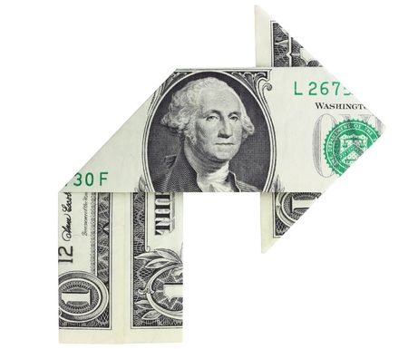 Dollar bill folded in the shape of a right turn arrow, isolated on a white background.の写真素材
