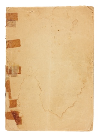An old pamphlet viewed from above with very old, yellowed tape on the broken binding.  The cover page is water stained, torn and yellowing with rough edges and dog-eared corners and is blank with room for text and images. Isolated on white
