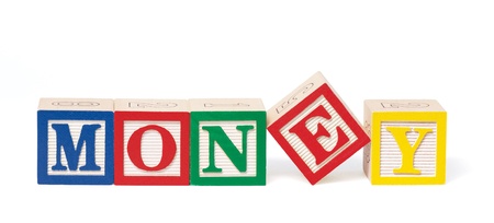 Alphabet blocks arranged to spell the word,  money    Isolated on white with clipping path の写真素材