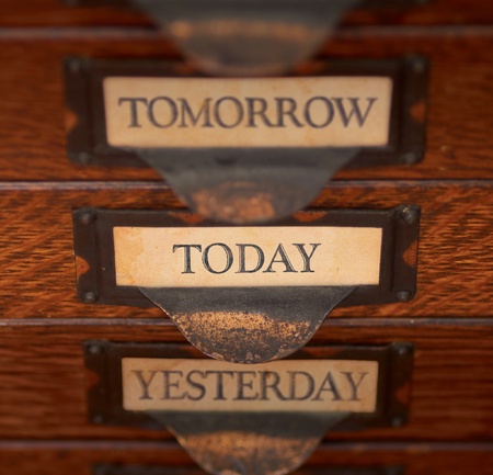 Stack of three old, oak flat file drawers with quoteの写真素材