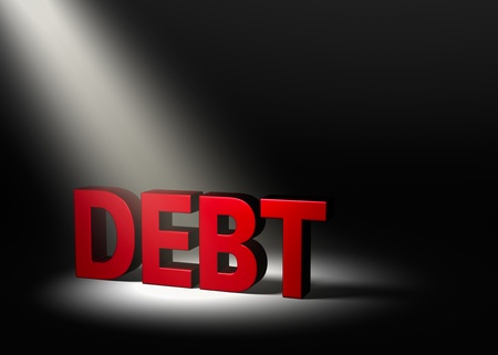 Shiny red  DEBT  in the dark, illuminated by a single spotlight from above left の写真素材
