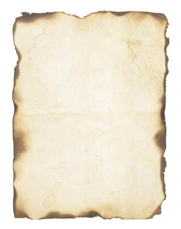 Very old, creased paper with fire damaged and burned edges  Blank with room for text or images  Isolated on white の写真素材