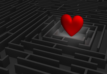 A spotlight reveals a large, red heart at the center of a dark maze.の写真素材